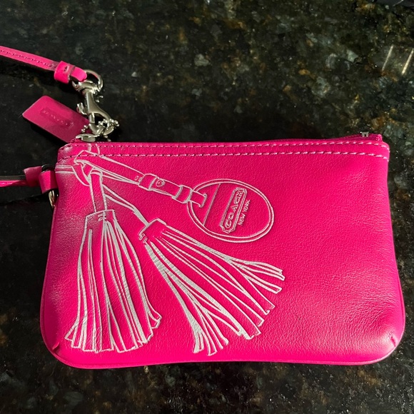 Coach Handbags - Coach bright pink soft leather embossed design Silver hardware wristlet wallet